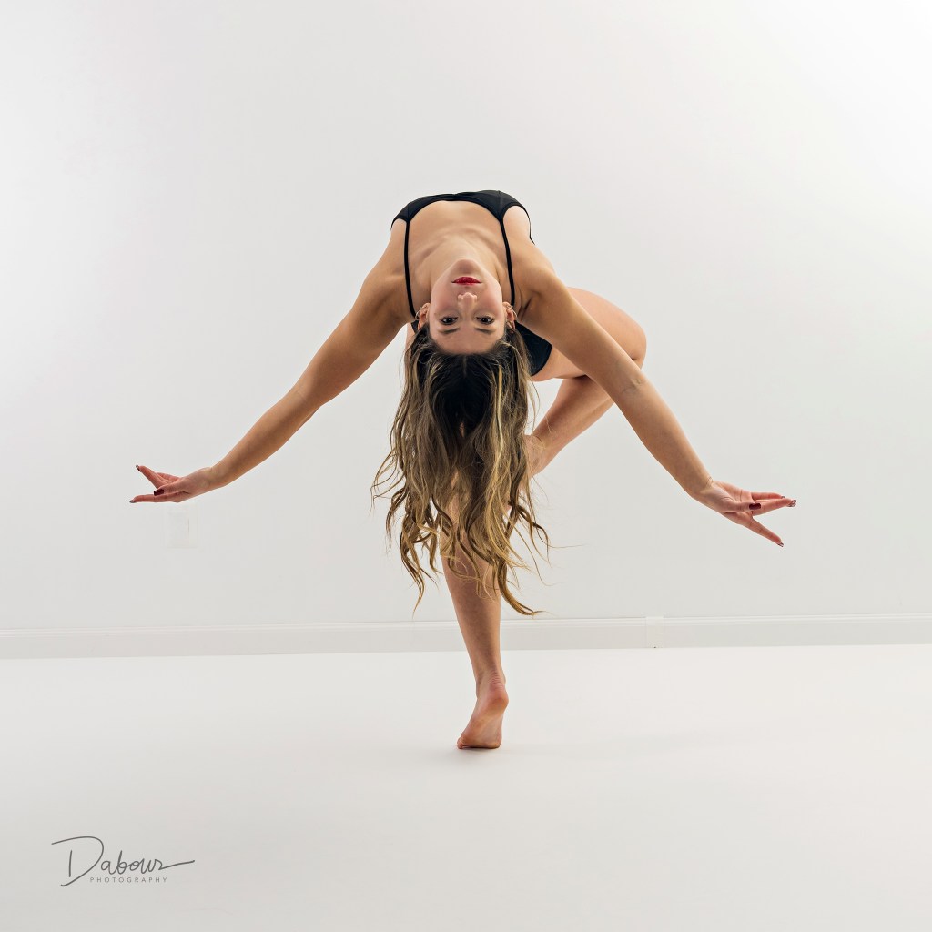 Professional dance audition portrait of Mia by Dave Dabour Photography, showcasing technical lines and artistic expression.