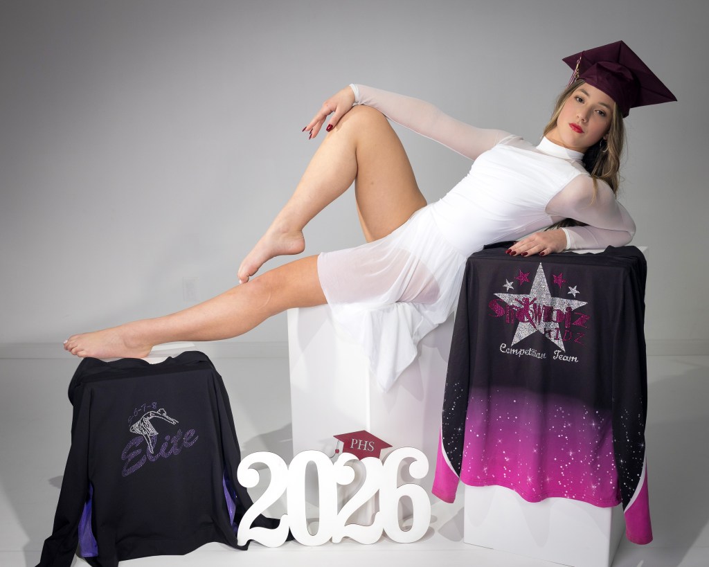 Senior dance photography of Mia by Dave Dabour Photography, featuring custom graduation props and dance studio highlights for a 2026 senior portfolio.